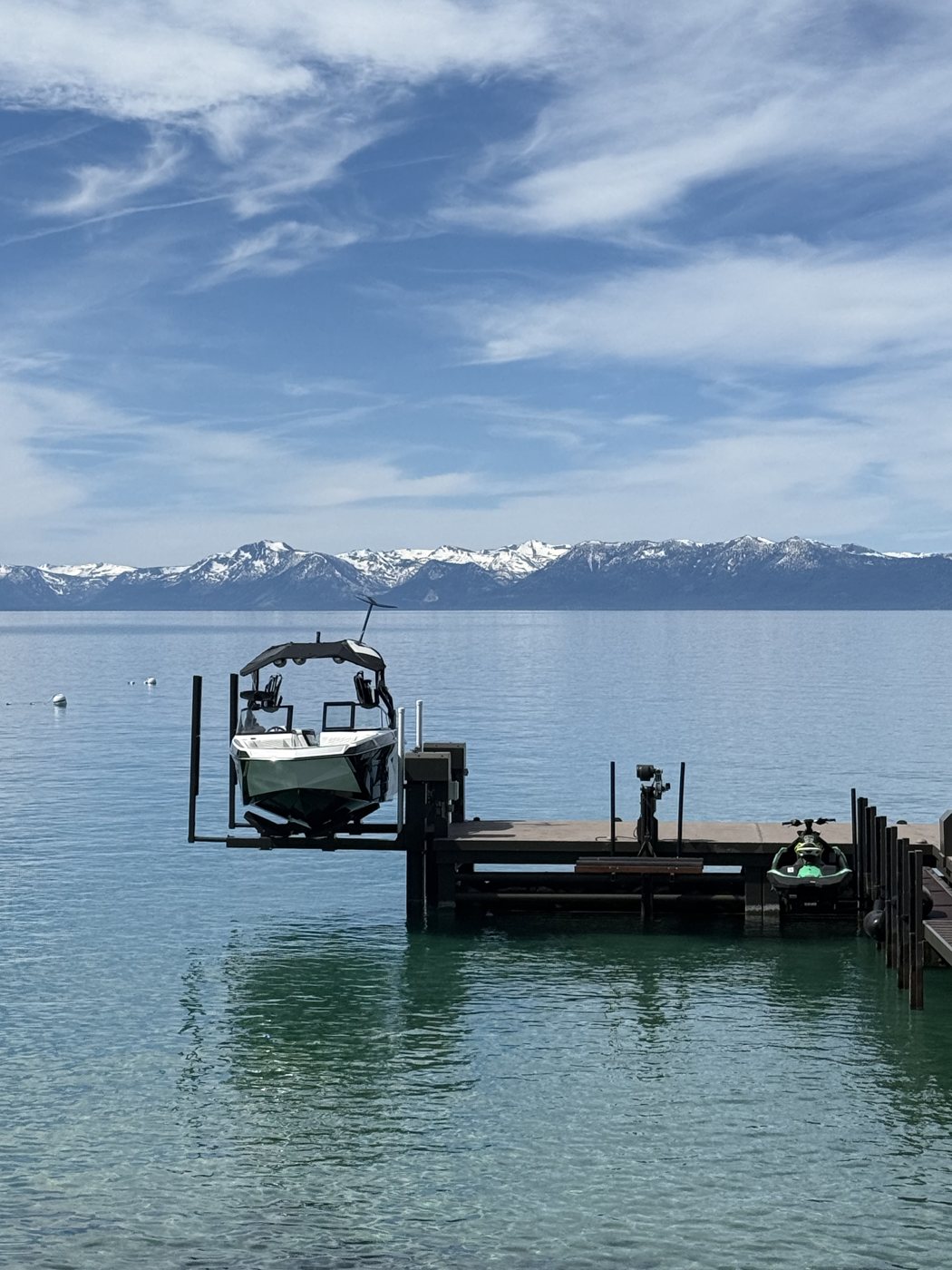 Boat on a lift at a Lake Tahoe dock